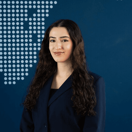 Woman in black on blue background
