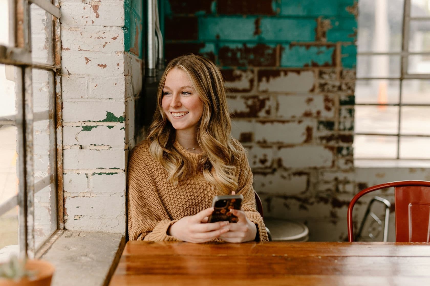 Woman holding a phone